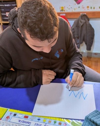 Anthony writing the letter N